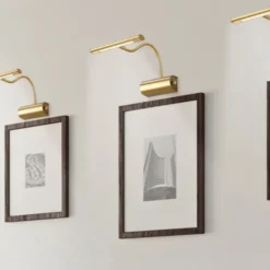 Trio Lighting Curtis væglampe, antik messing